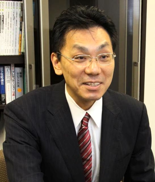 野村 泰信の写真